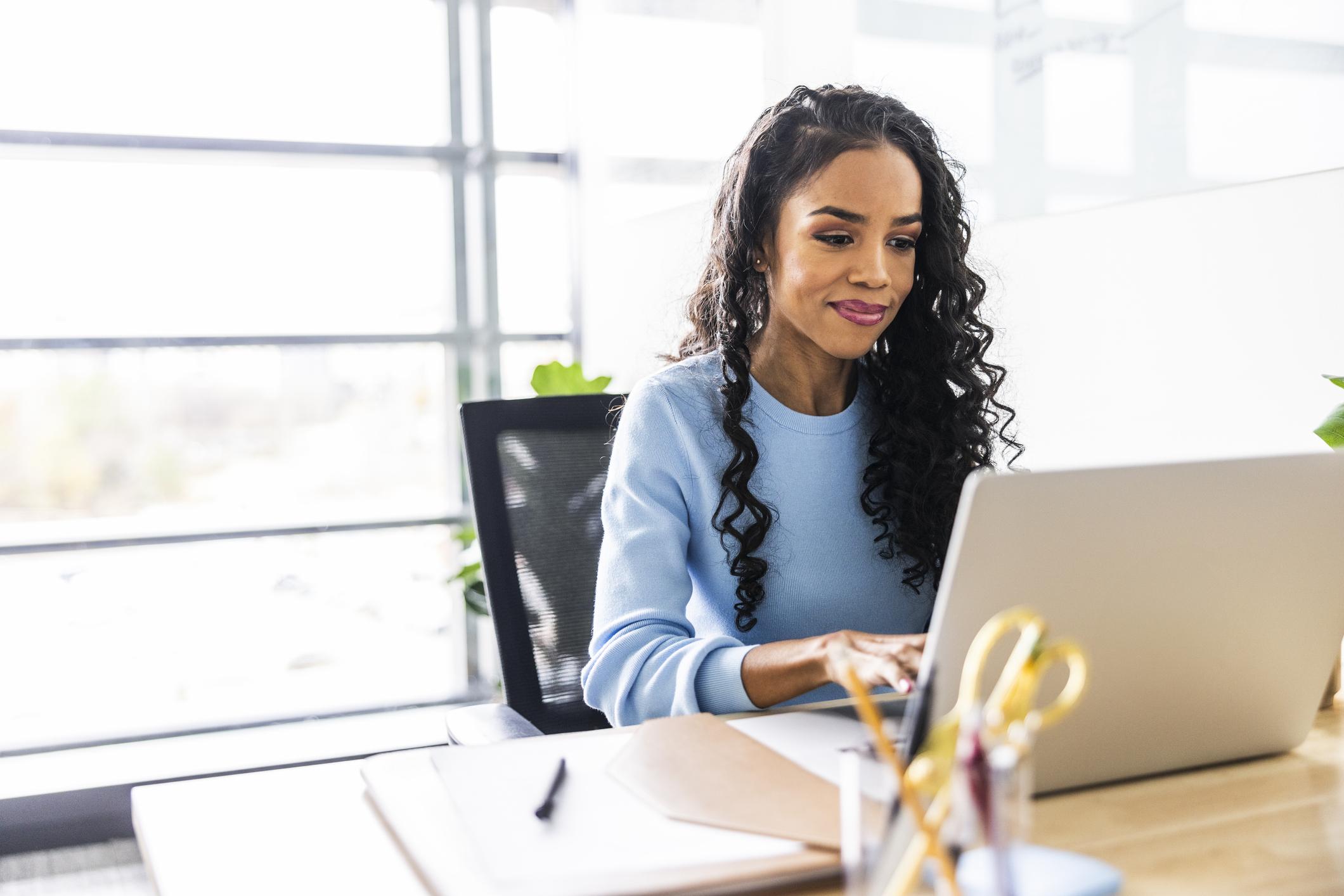 Curly Hair Women on Computer