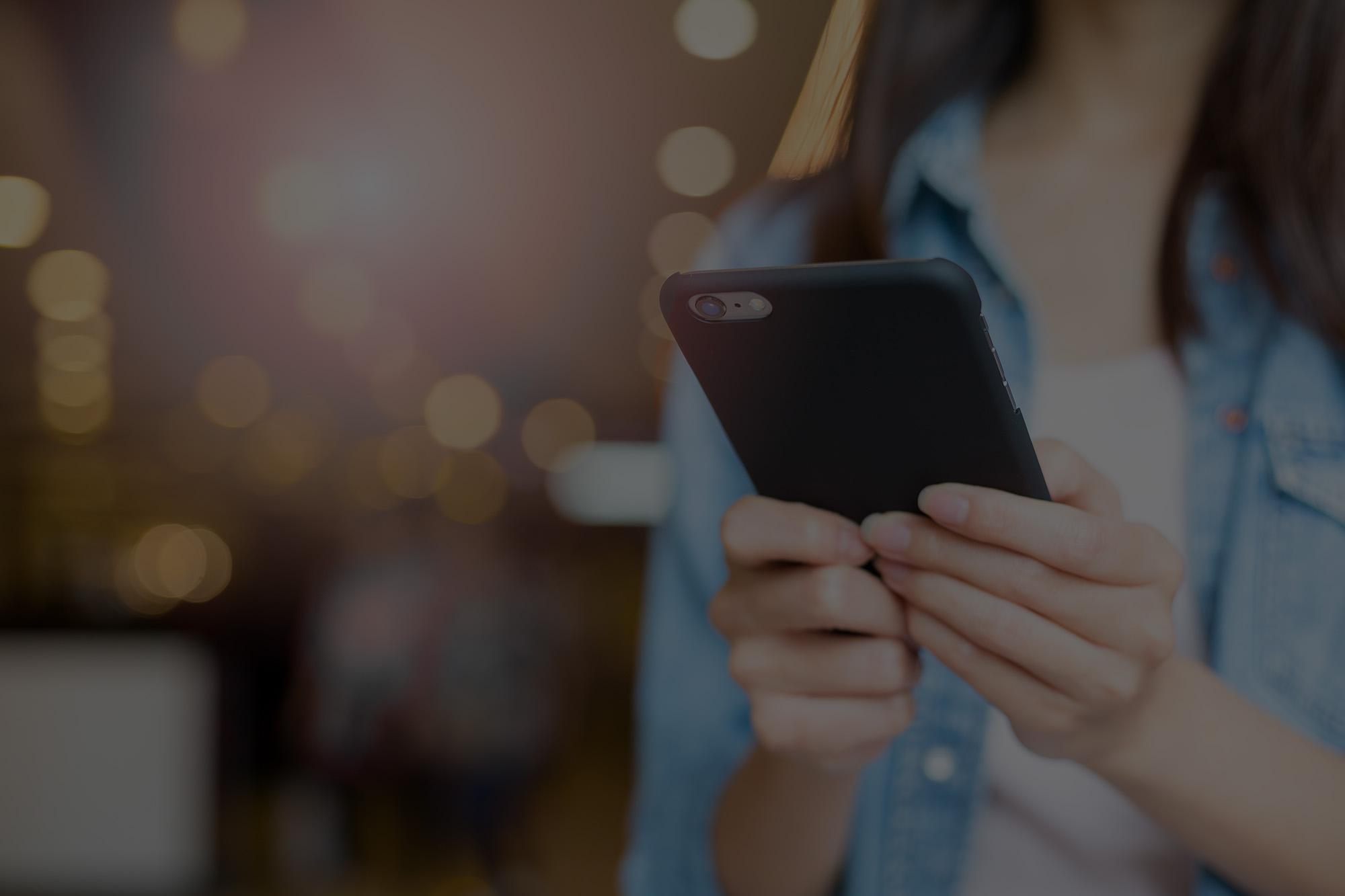 Close up of a cell phone in a hand